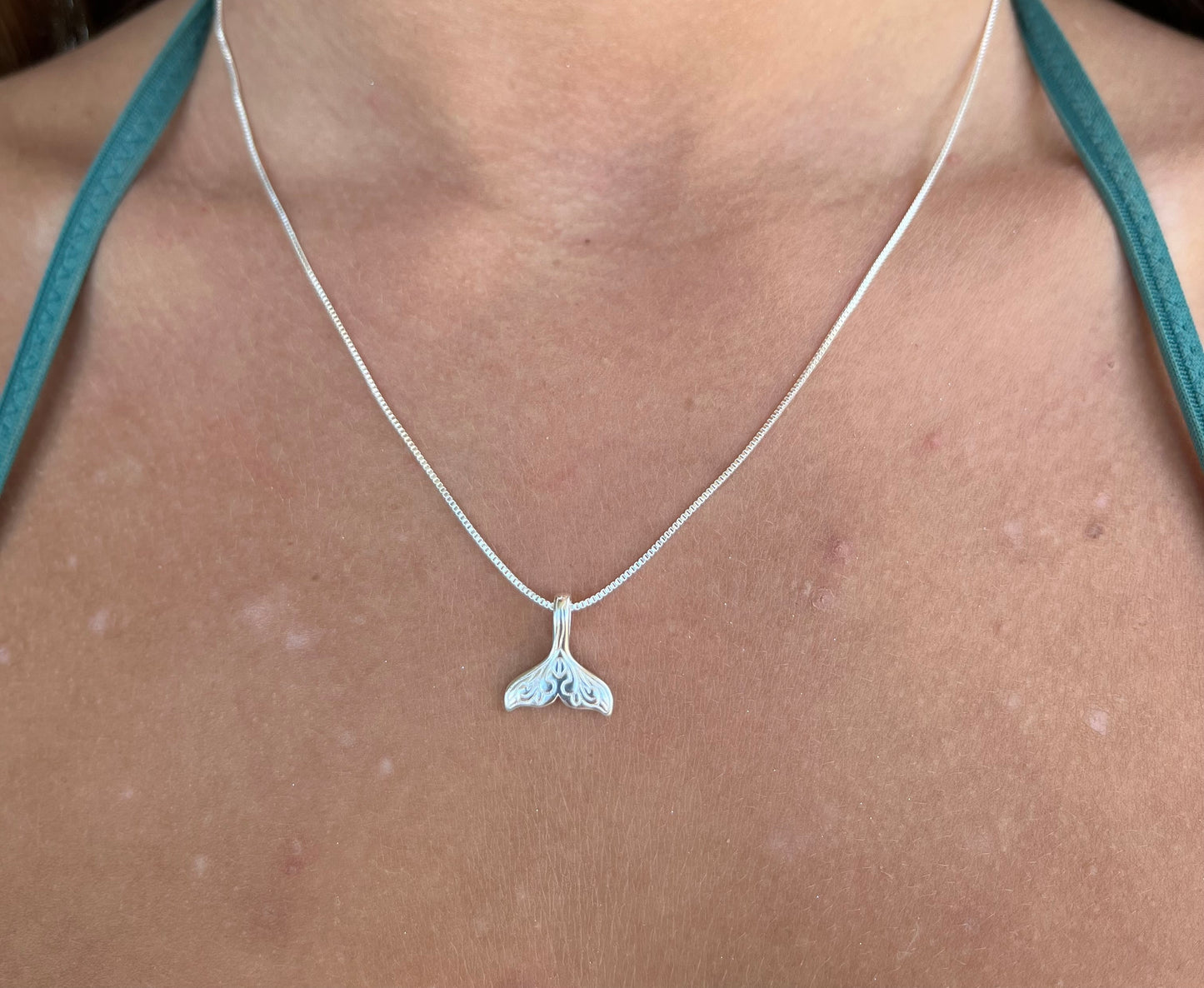 Elegant whale tail necklace