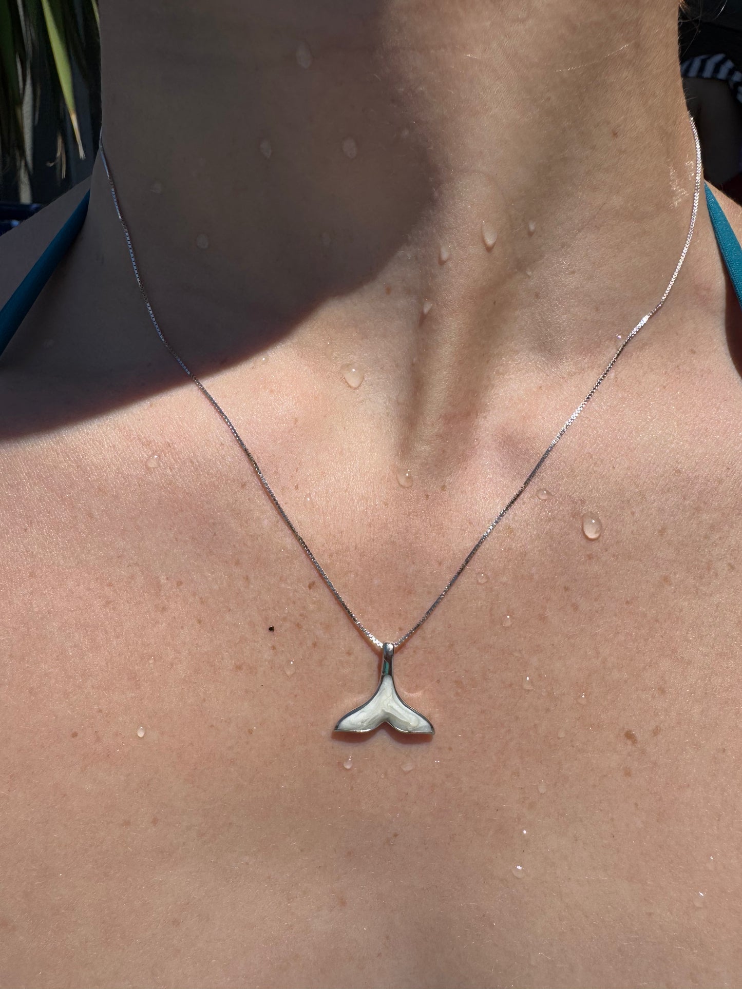 Mother of pearl whale tail necklace